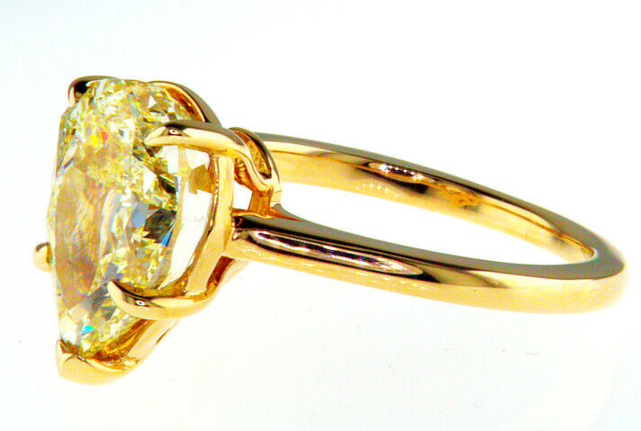 14k Yellow Gold G.I.A. Certified .73 carat Round Brilliant Cut Diamond  Solitaire Ring